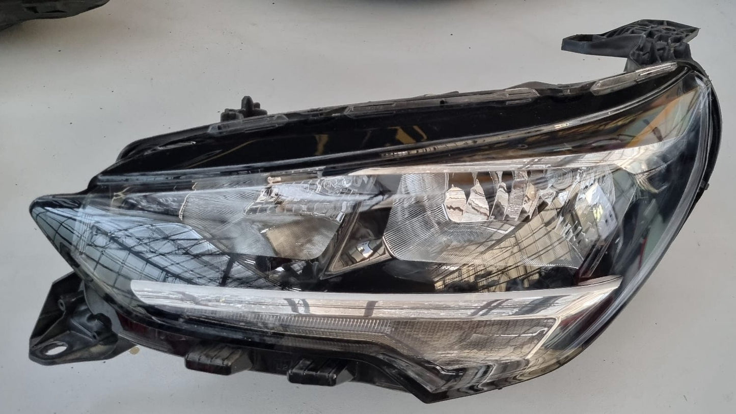 KOPLAMP OPEL CORSA F RECHTS 9829465580